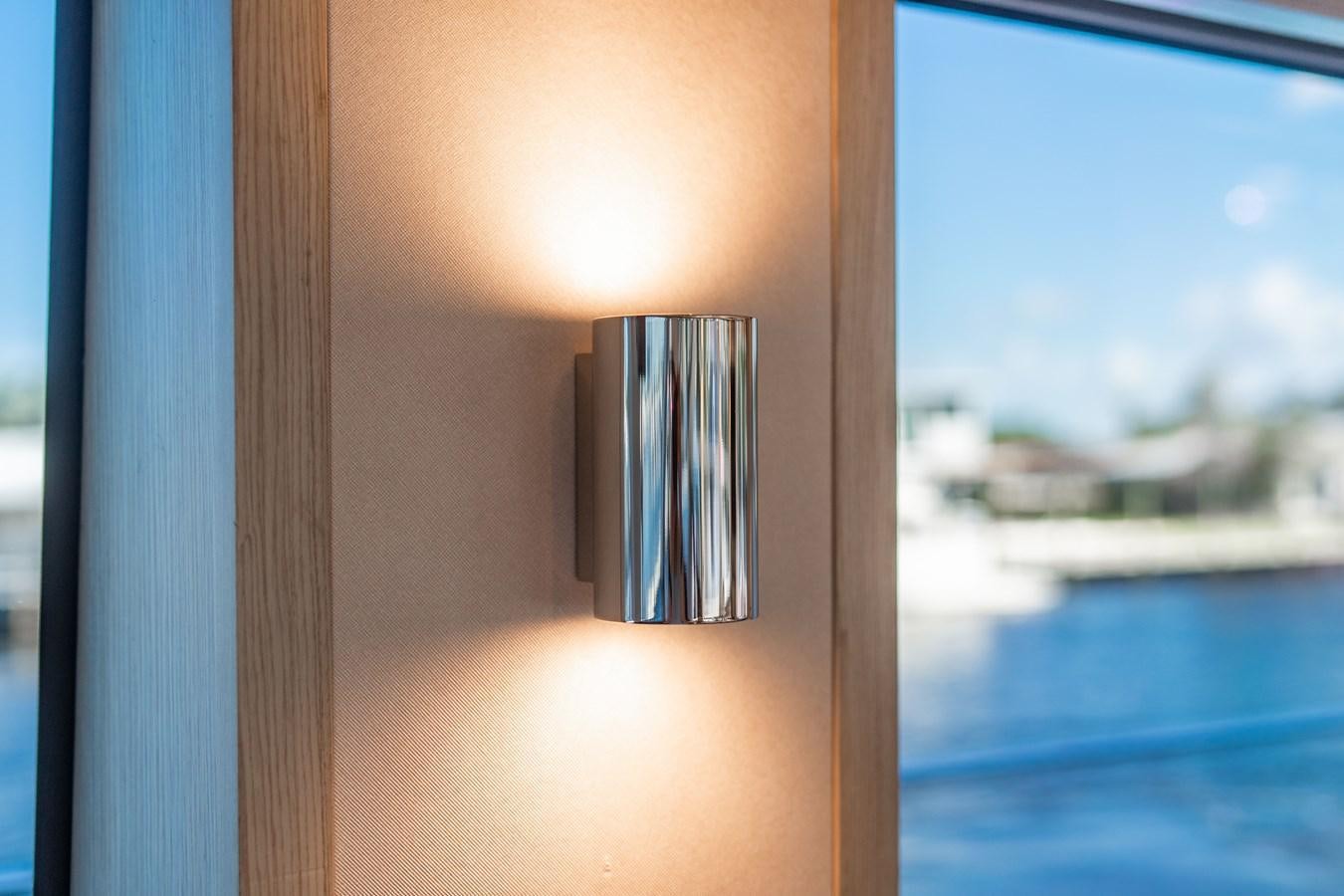 a window with a window aboard PLANE TO SEA Yacht for Sale