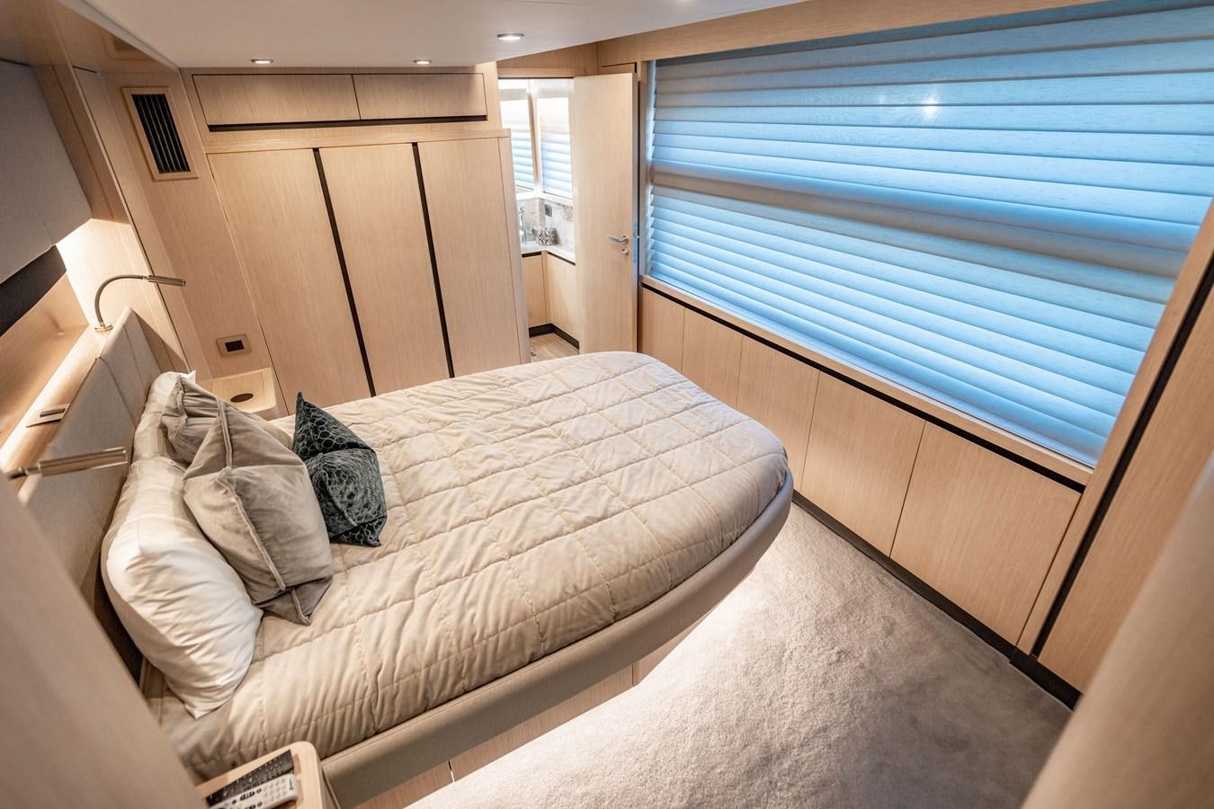 a bed in a room aboard PLANE TO SEA Yacht for Sale