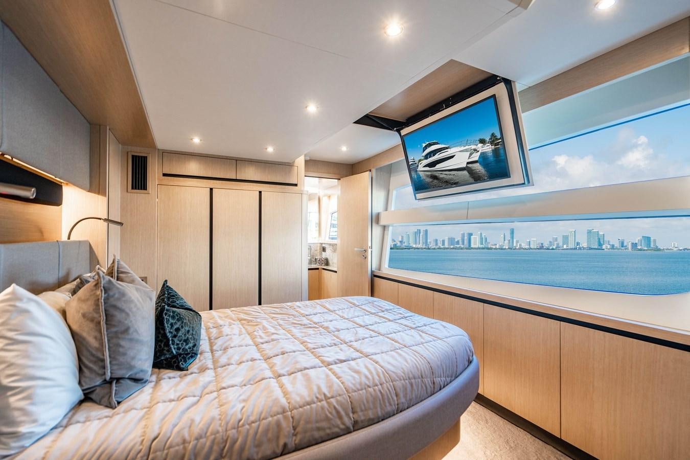a bed in a room aboard PLANE TO SEA Yacht for Sale