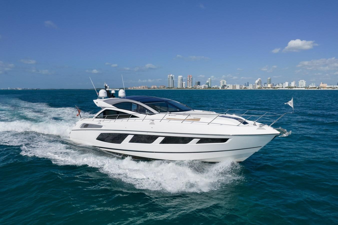 a white yacht on the water aboard SUNSEEKER PREDATOR 68 Yacht for Sale