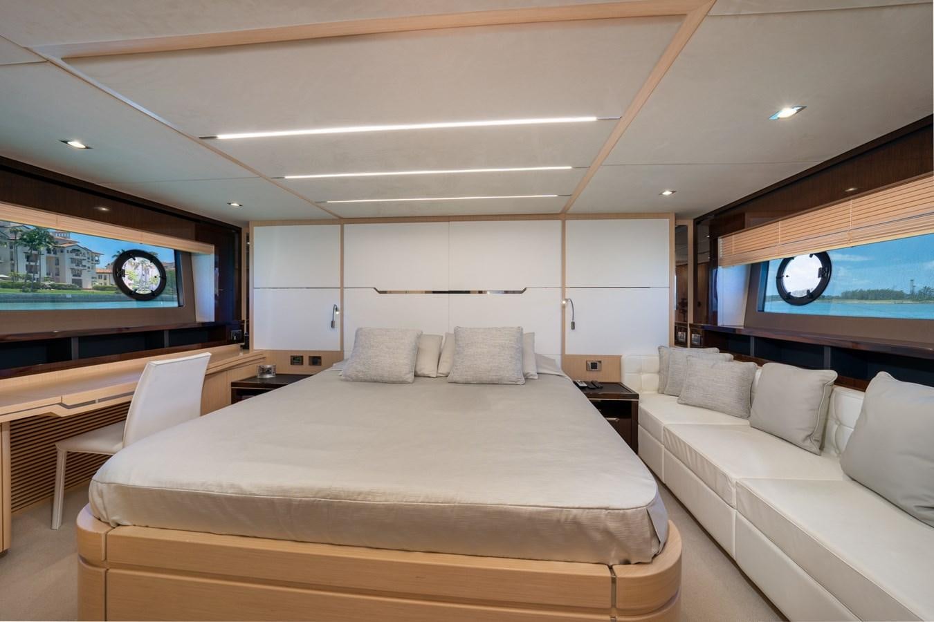 a room with a bed and a television aboard SUNSEEKER PREDATOR 68 Yacht for Sale