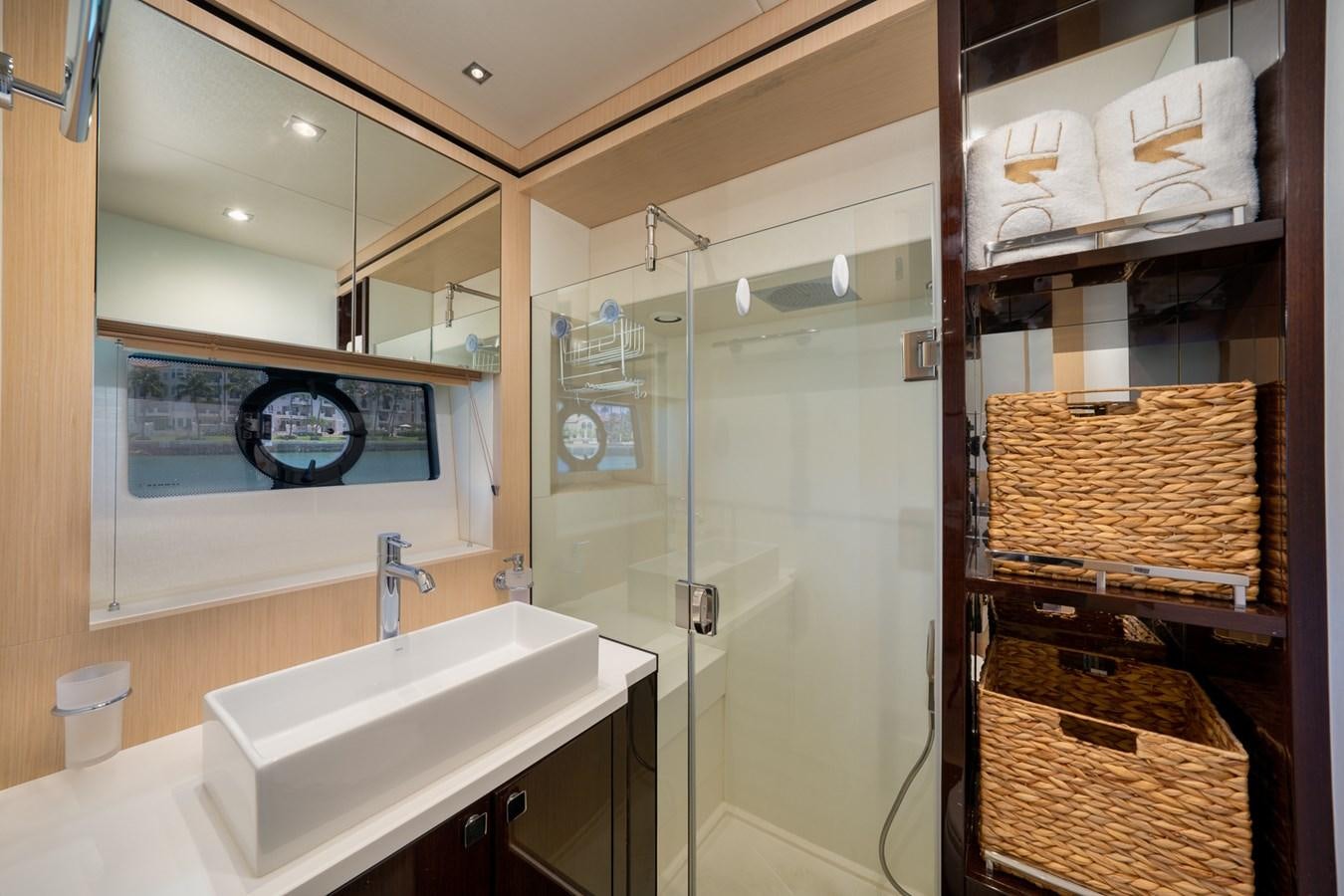 a bathroom with a shower unit and sink aboard SUNSEEKER PREDATOR 68 Yacht for Sale