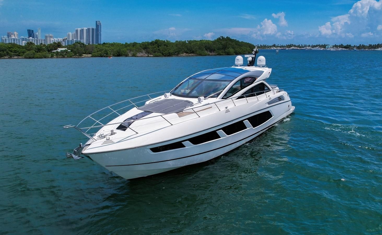 a white yacht in the water aboard SUNSEEKER PREDATOR 68 Yacht for Sale