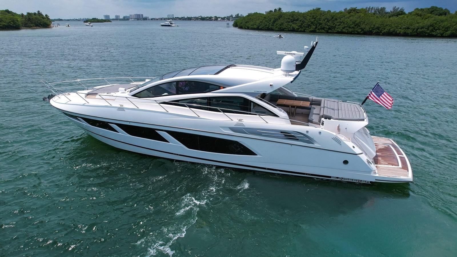 a boat on the water aboard SUNSEEKER PREDATOR 68 Yacht for Sale