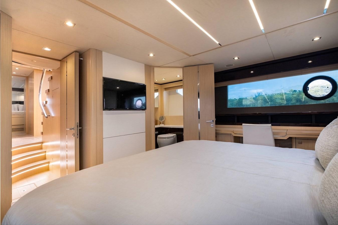 a large bed in a room aboard SUNSEEKER PREDATOR 68 Yacht for Sale