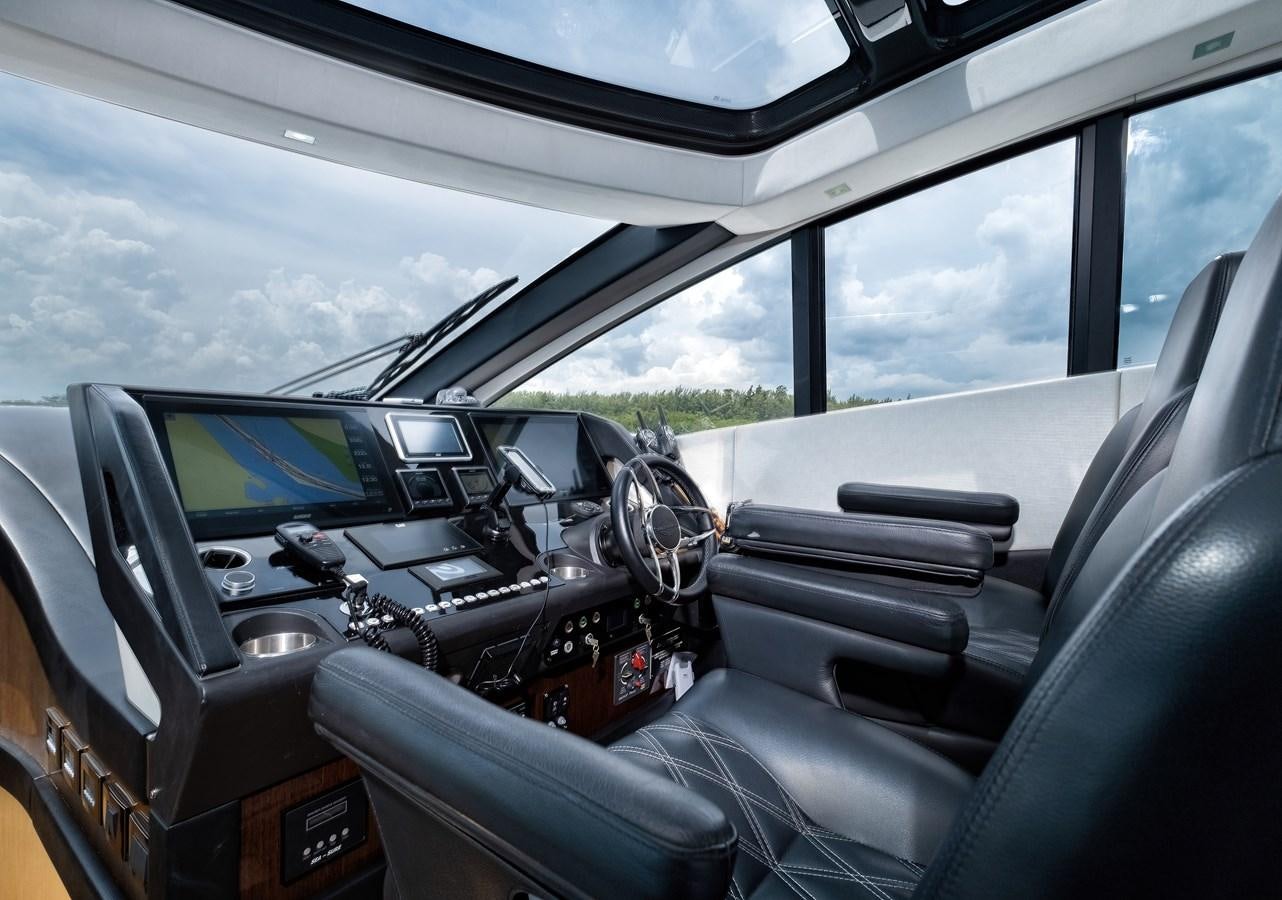 inside of a car aboard SUNSEEKER PREDATOR 68 Yacht for Sale