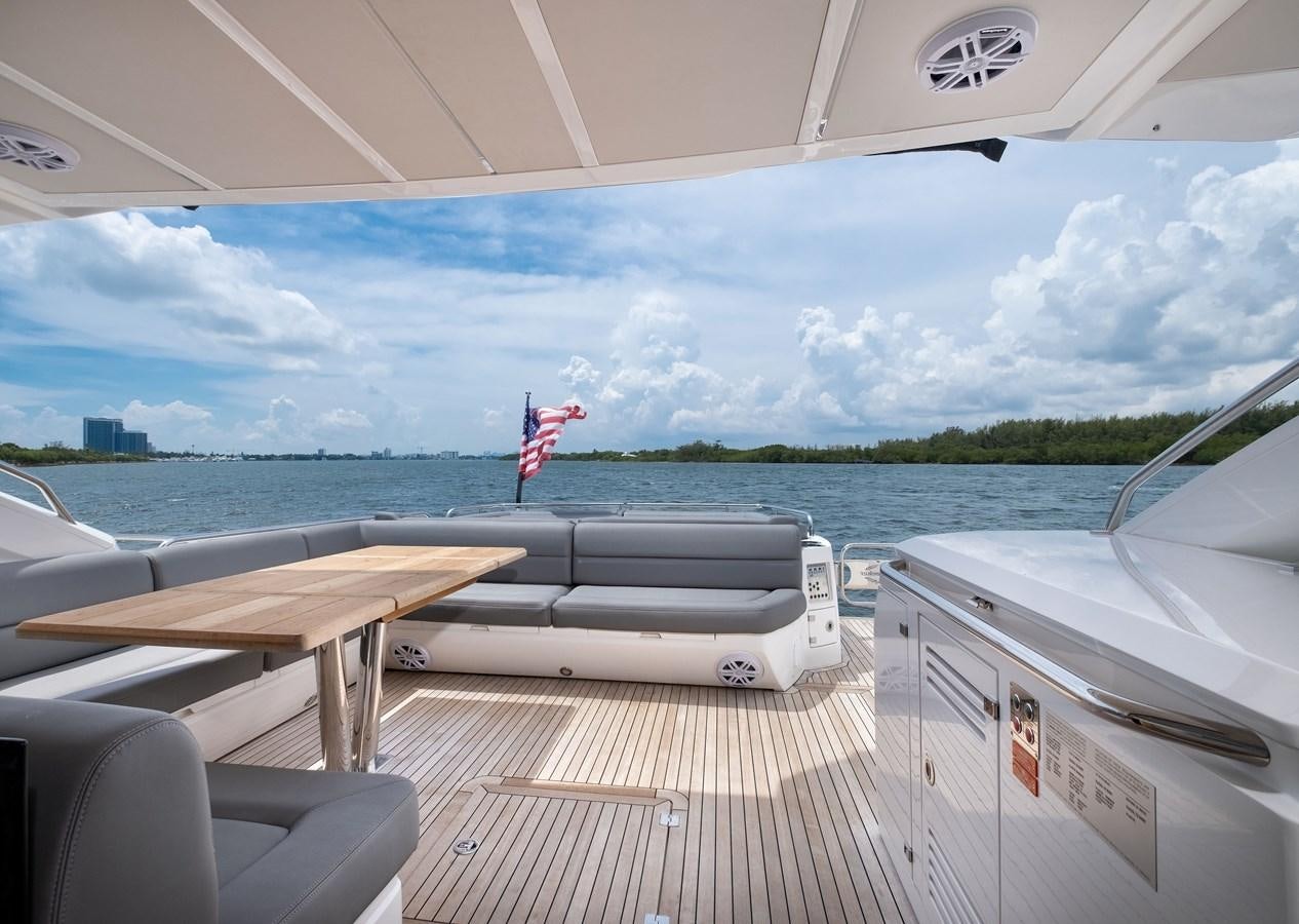 a boat on the water aboard SUNSEEKER PREDATOR 68 Yacht for Sale