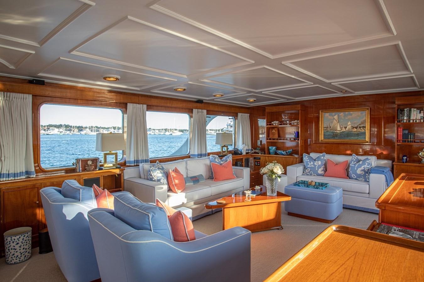 a living room with a couch and a coffee table aboard MARYBELLE Yacht for Sale