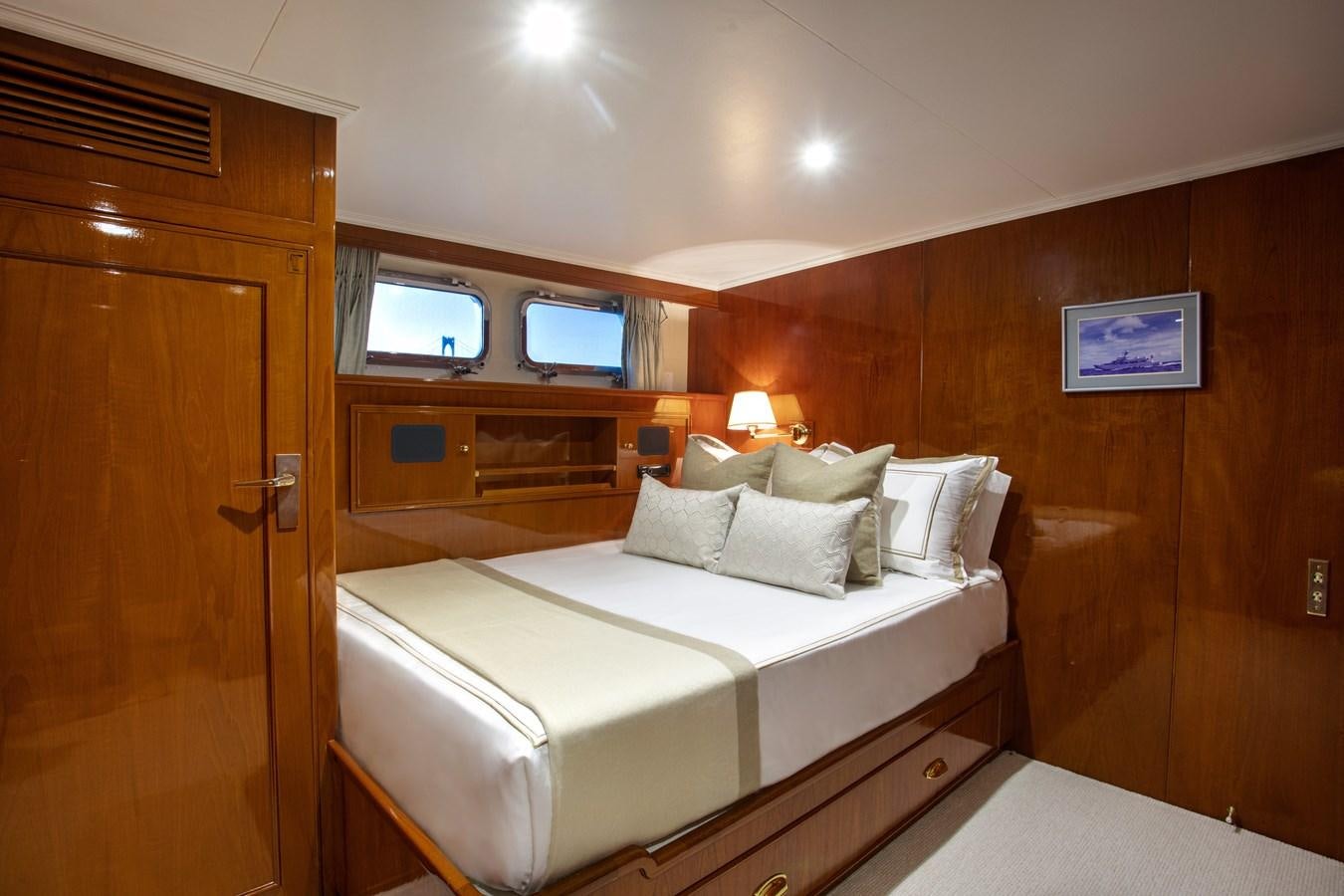 a bed in a room aboard MARYBELLE Yacht for Sale