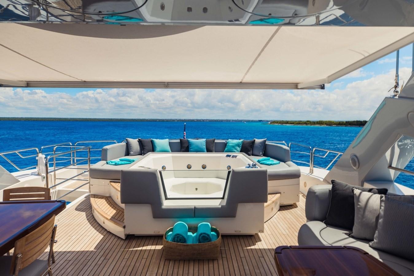a large white bed on a boat aboard TAYRONA Yacht for Sale