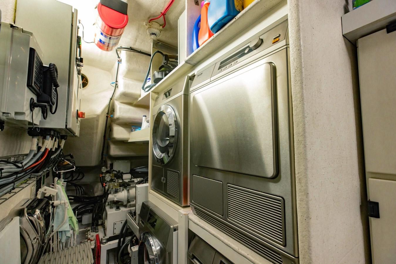 a large machine with a large square hole in the side aboard TAYRONA Yacht for Sale