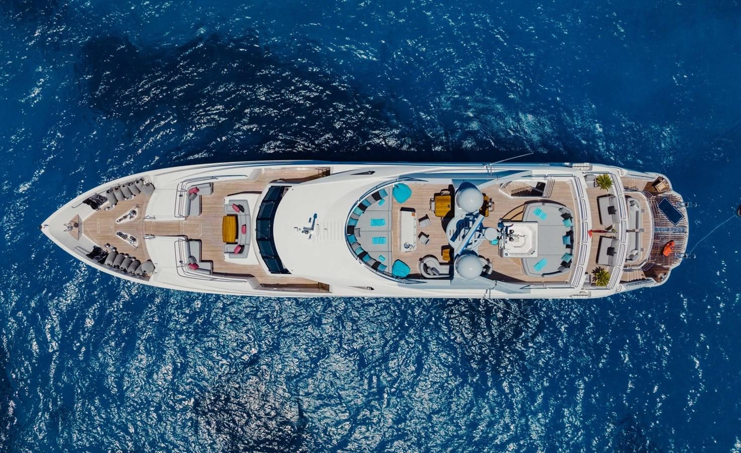 a spaceship flying over a planet aboard TAYRONA Yacht for Sale