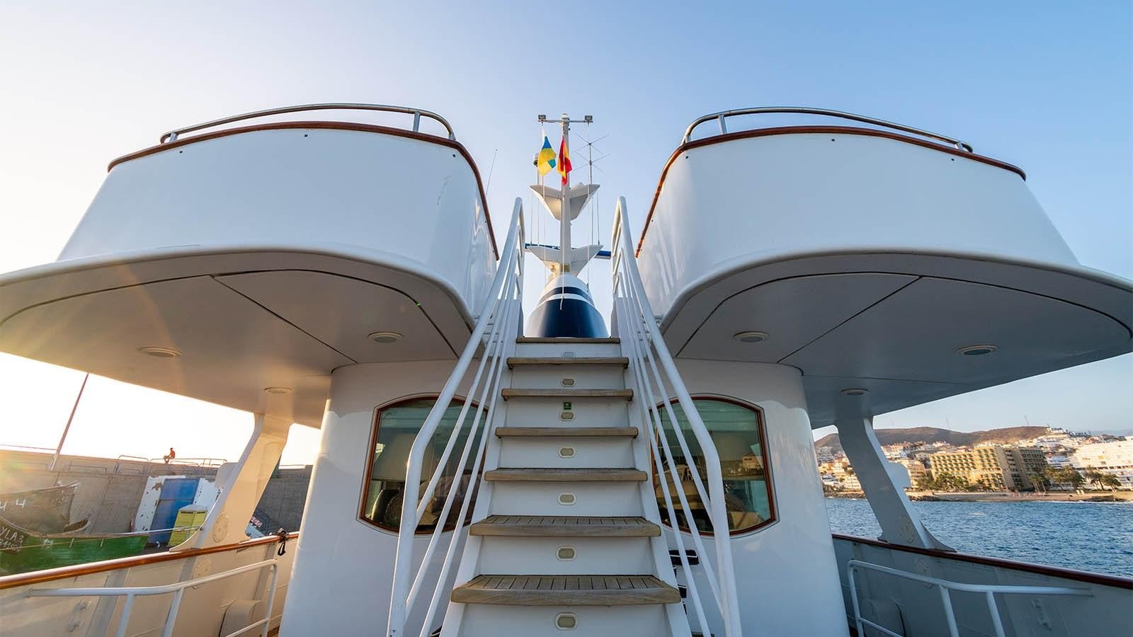 a white and grey staircase leading to a large white building with a dome and a railing and a aboard CHANTAL Yacht for Sale