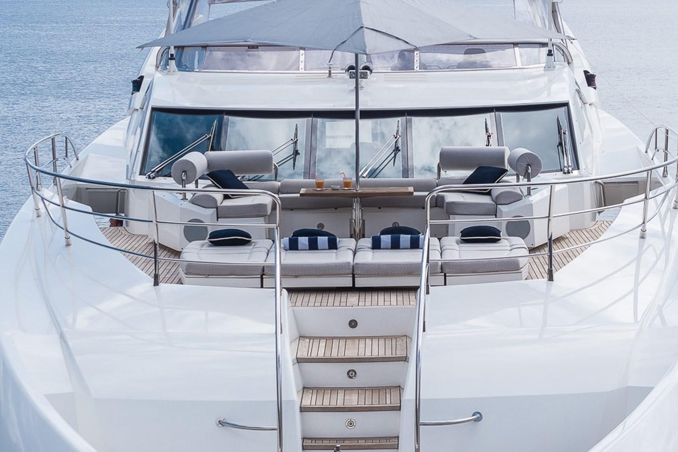 a white boat with a deck aboard INSIGNIA Yacht for Sale