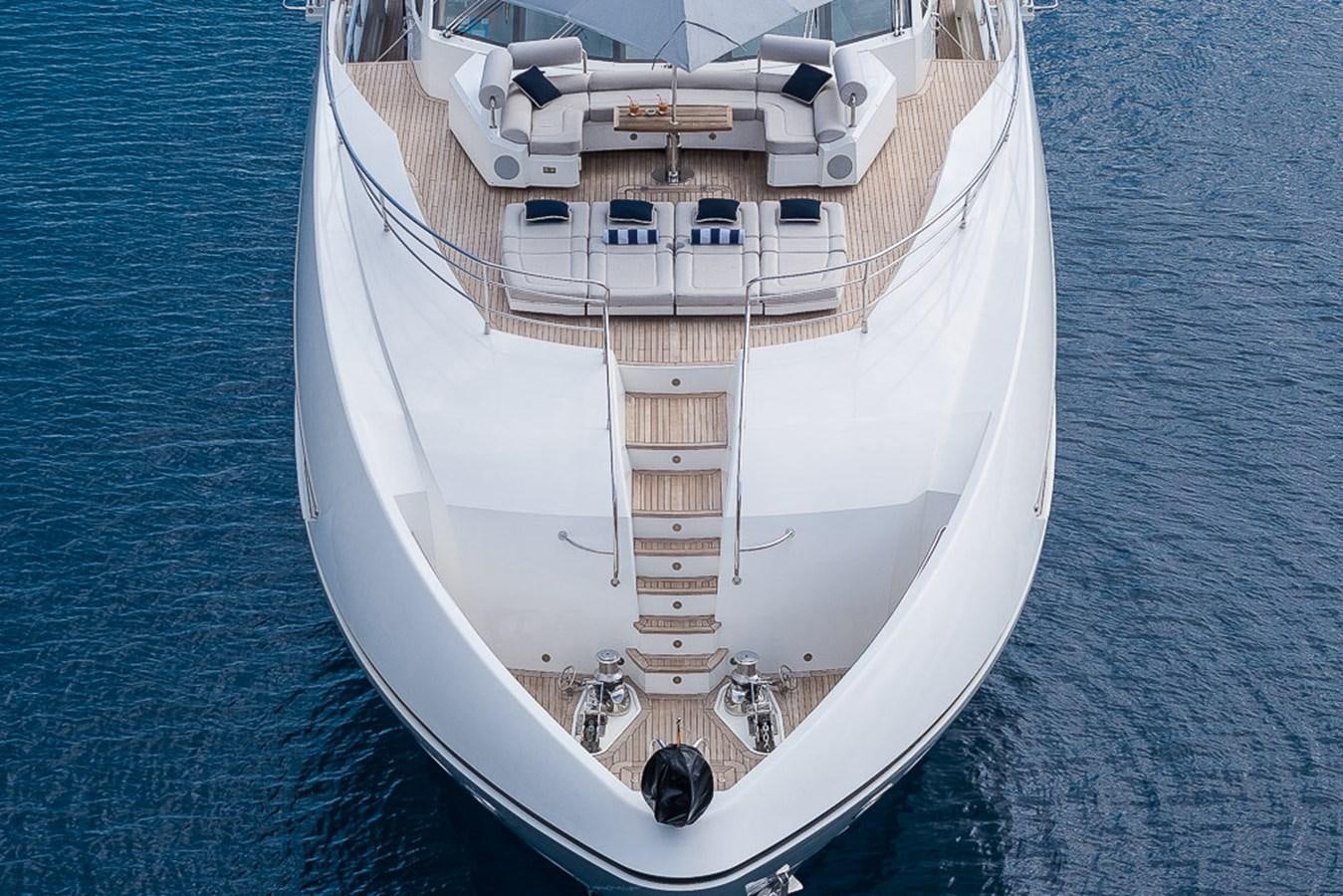 a large white ship in the water aboard INSIGNIA Yacht for Sale