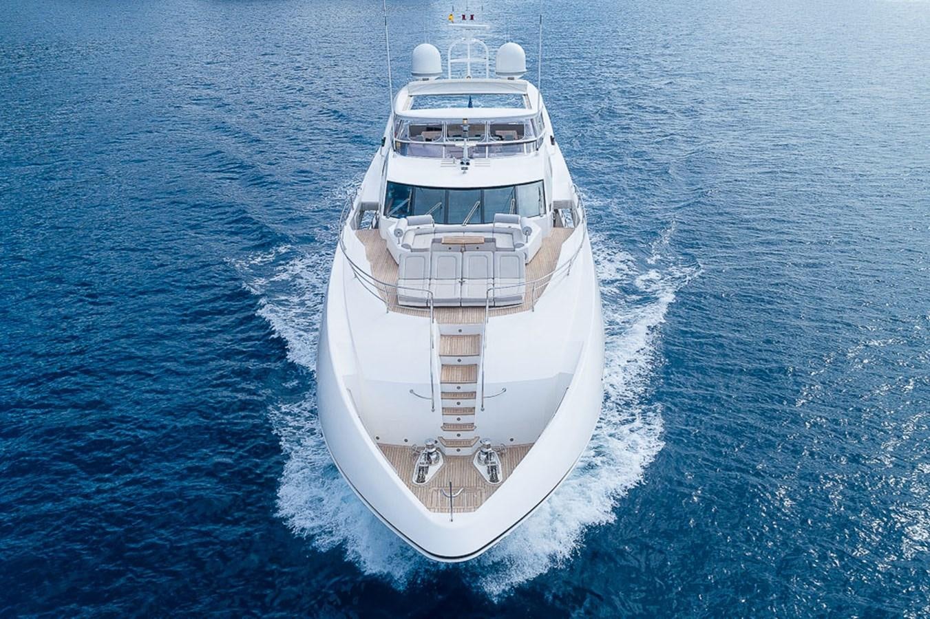 a large white ship in the water aboard INSIGNIA Yacht for Sale