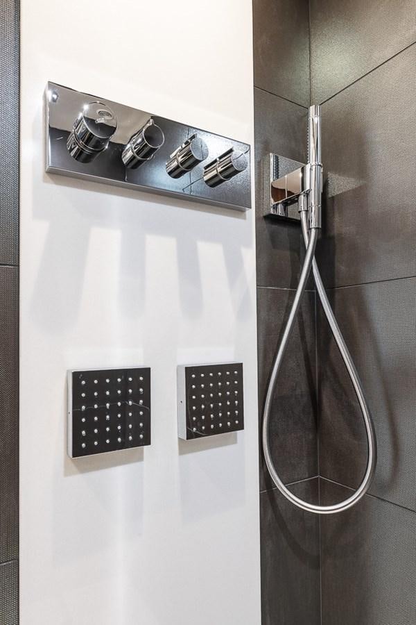 a shower head with a glass door aboard INSIGNIA Yacht for Sale