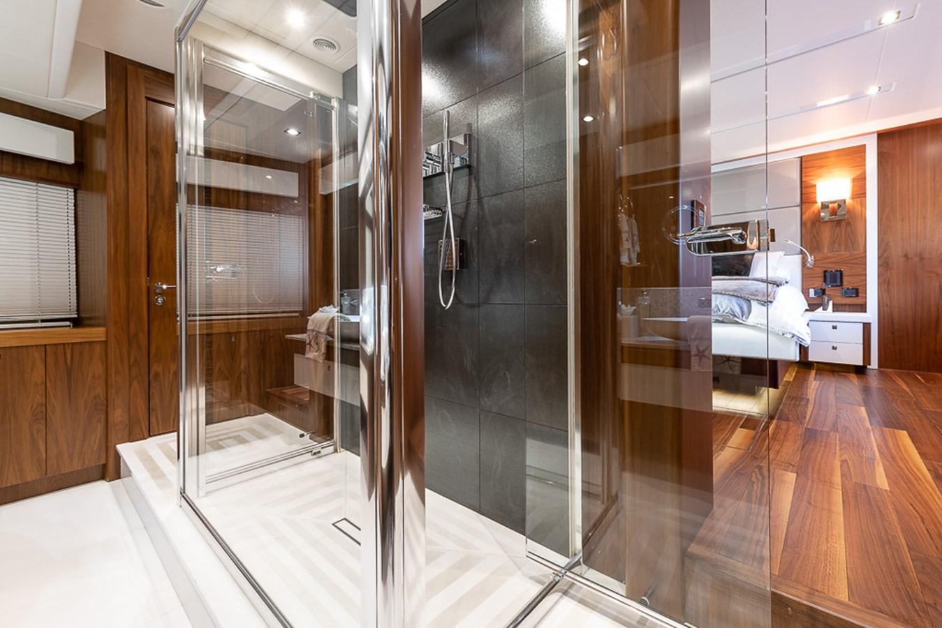 a room with a large glass door aboard INSIGNIA Yacht for Sale
