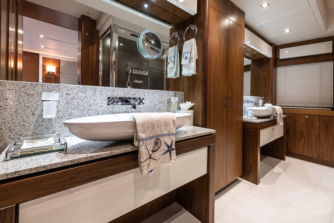 a bathroom with a large countertop aboard INSIGNIA Yacht for Sale