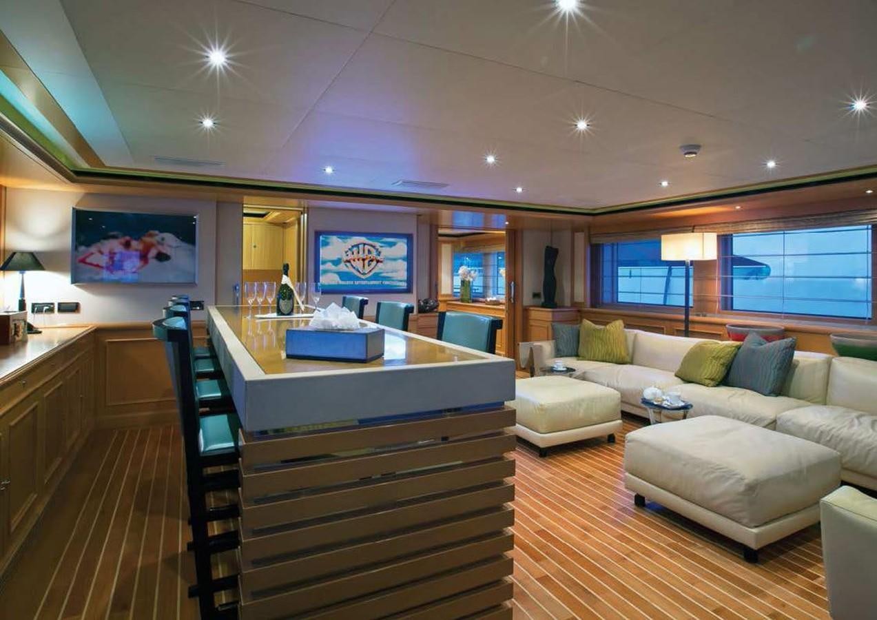 a kitchen and living room aboard HANA Yacht for Charter