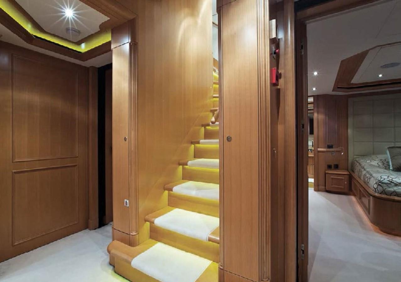 a room with wooden doors aboard HANA Yacht for Charter