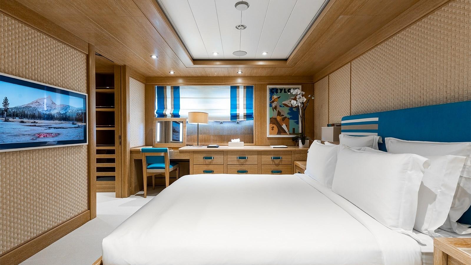 a large bed in a room aboard CLELIA III Yacht for Charter