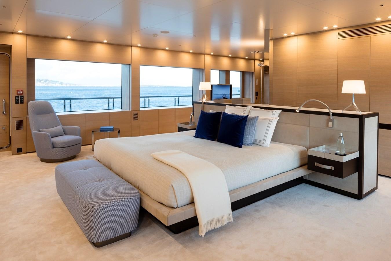 a large bed in a room aboard BOLD Yacht for Sale