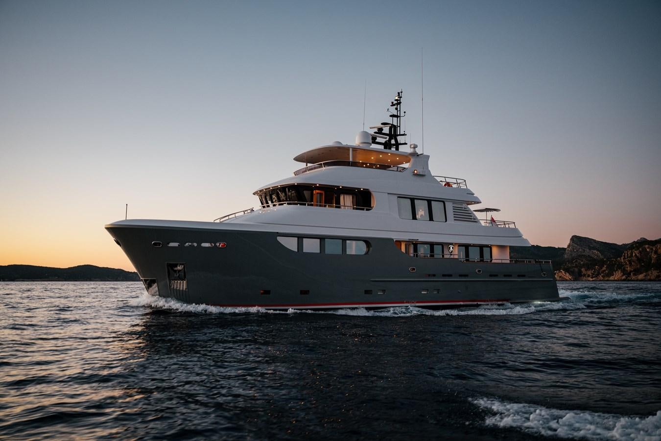 a large ship in the water aboard SEAL Yacht for Sale