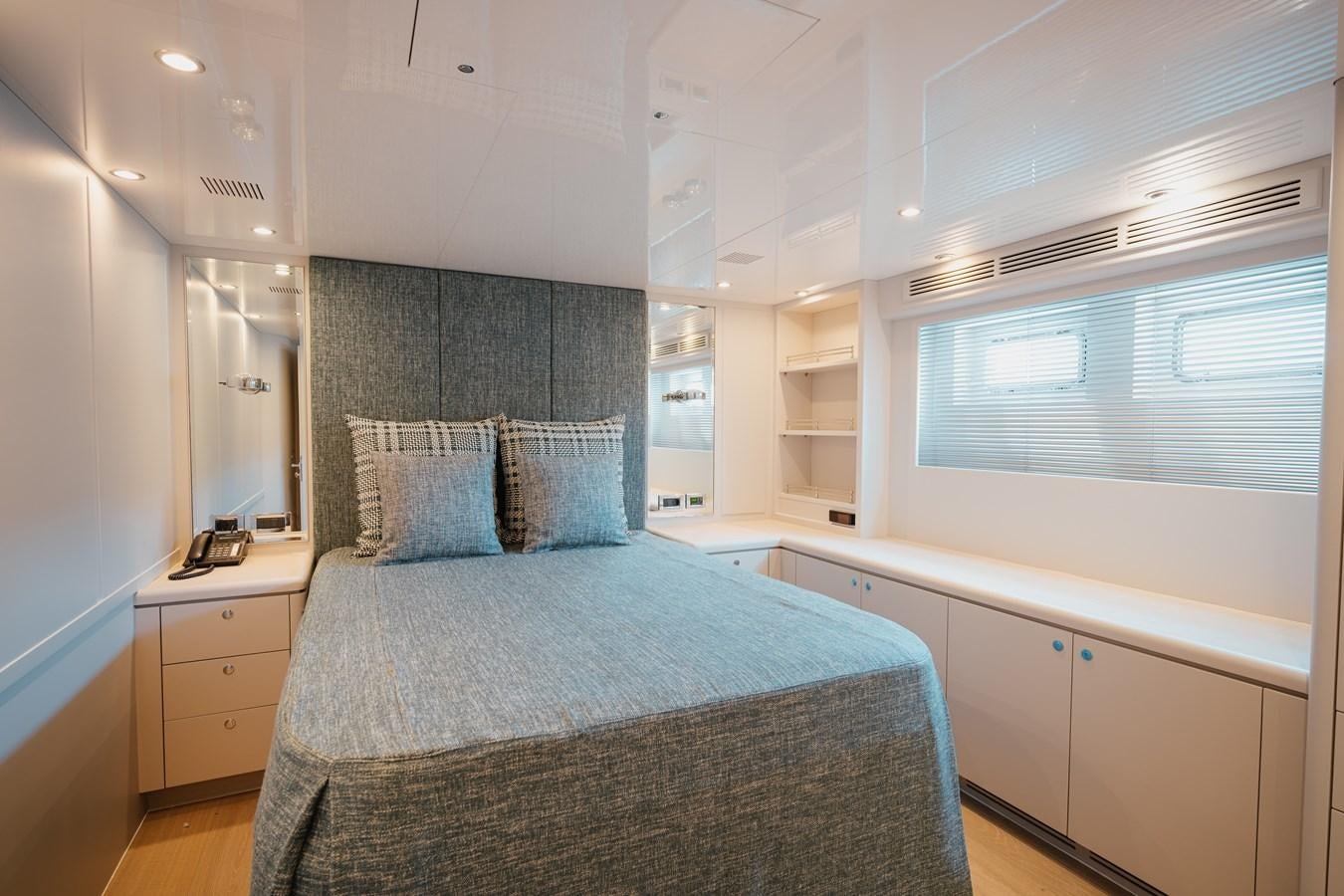 a bed in a room aboard SEAL Yacht for Sale