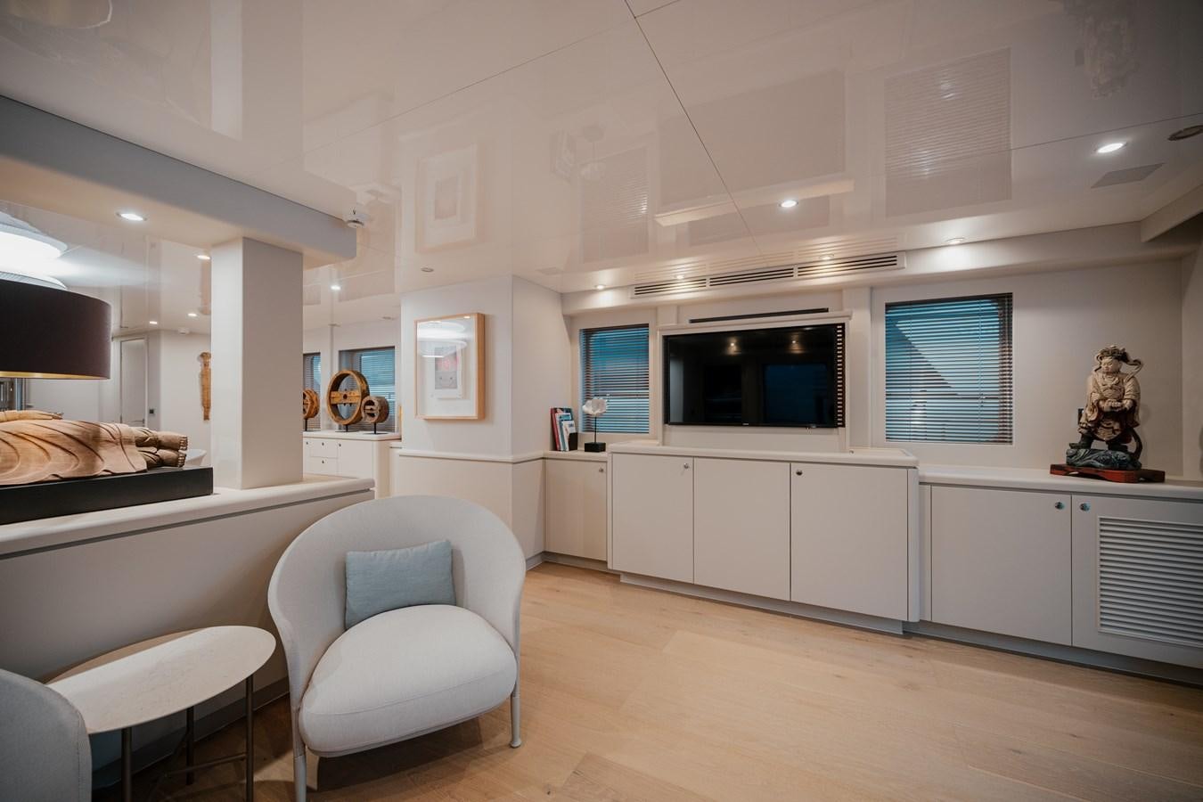 a room with a bed and a tv aboard SEAL Yacht for Sale