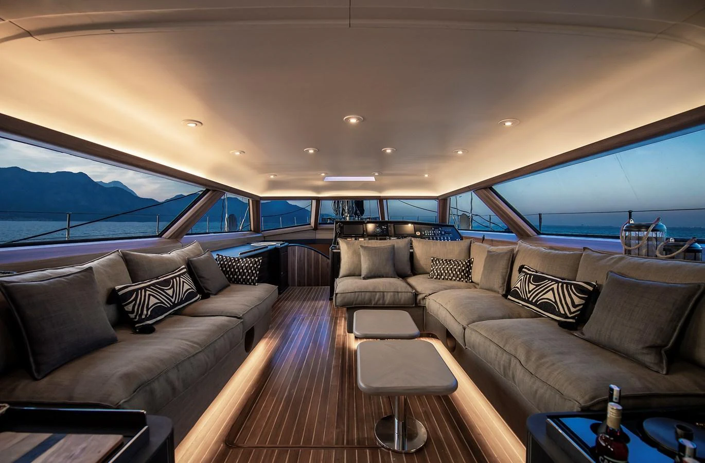 a living room with a large window aboard OCEAN PURE 2 Yacht for Sale