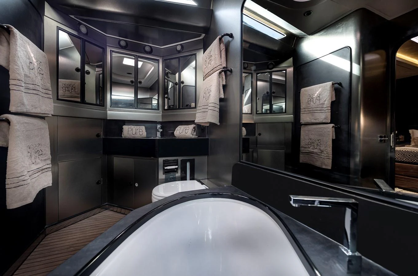 a bathroom with a large round tub aboard OCEAN PURE 2 Yacht for Sale