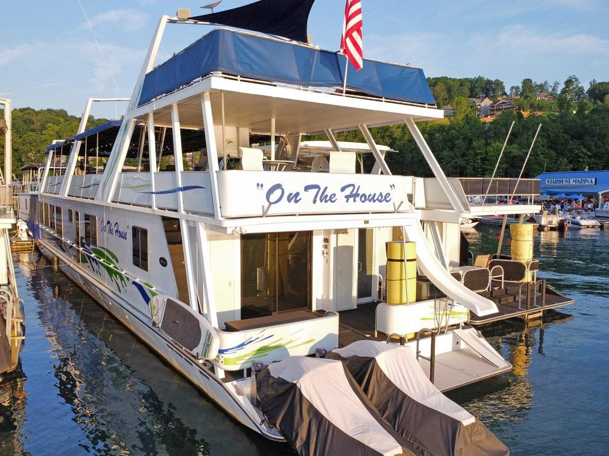 a boat docked at a pier aboard 2010/1995 STARDUST 20 X 95WB NLST Yacht for Sale