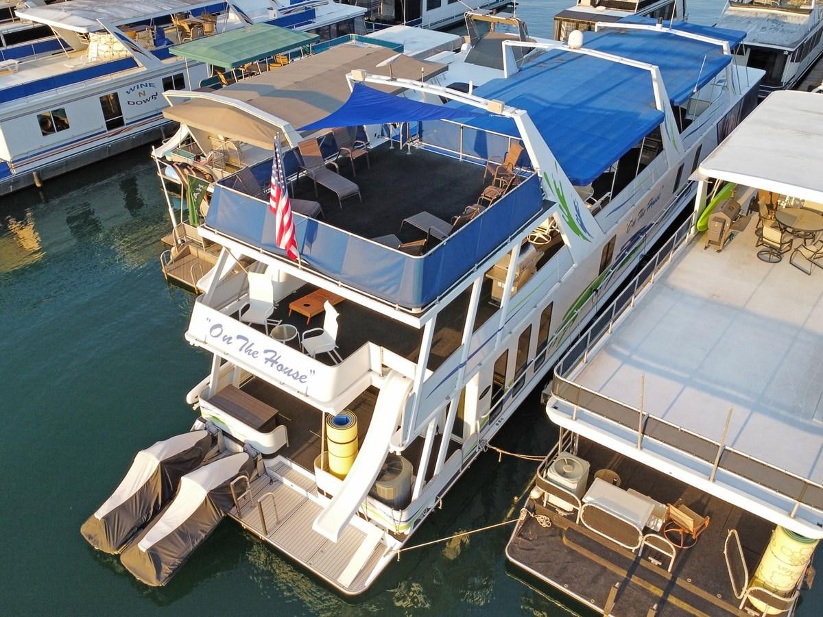 a boat docked at a pier aboard 2010/1995 STARDUST 20 X 95WB NLST Yacht for Sale