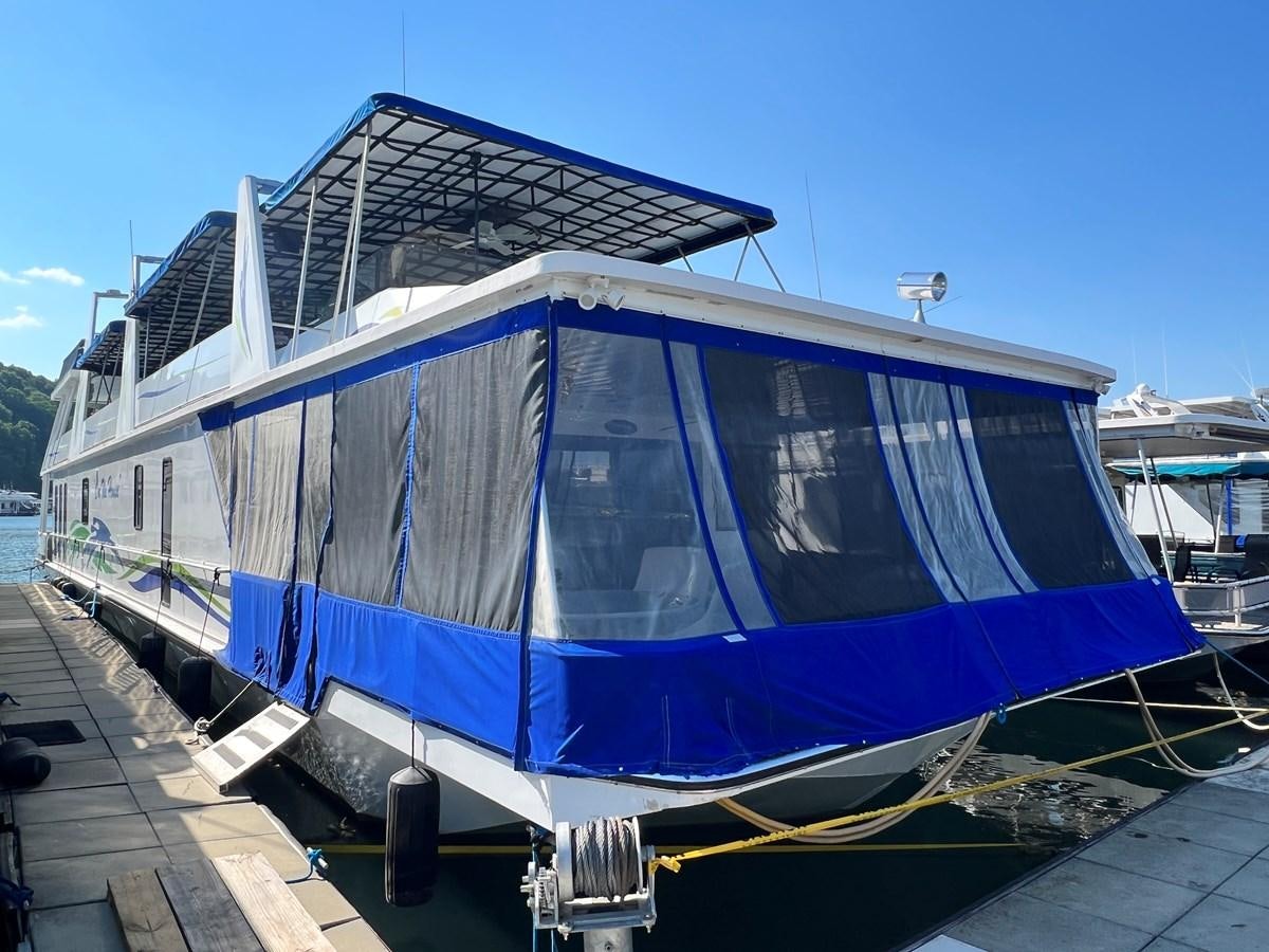 a boat docked at a pier aboard 2010/1995 STARDUST 20 X 95WB NLST Yacht for Sale