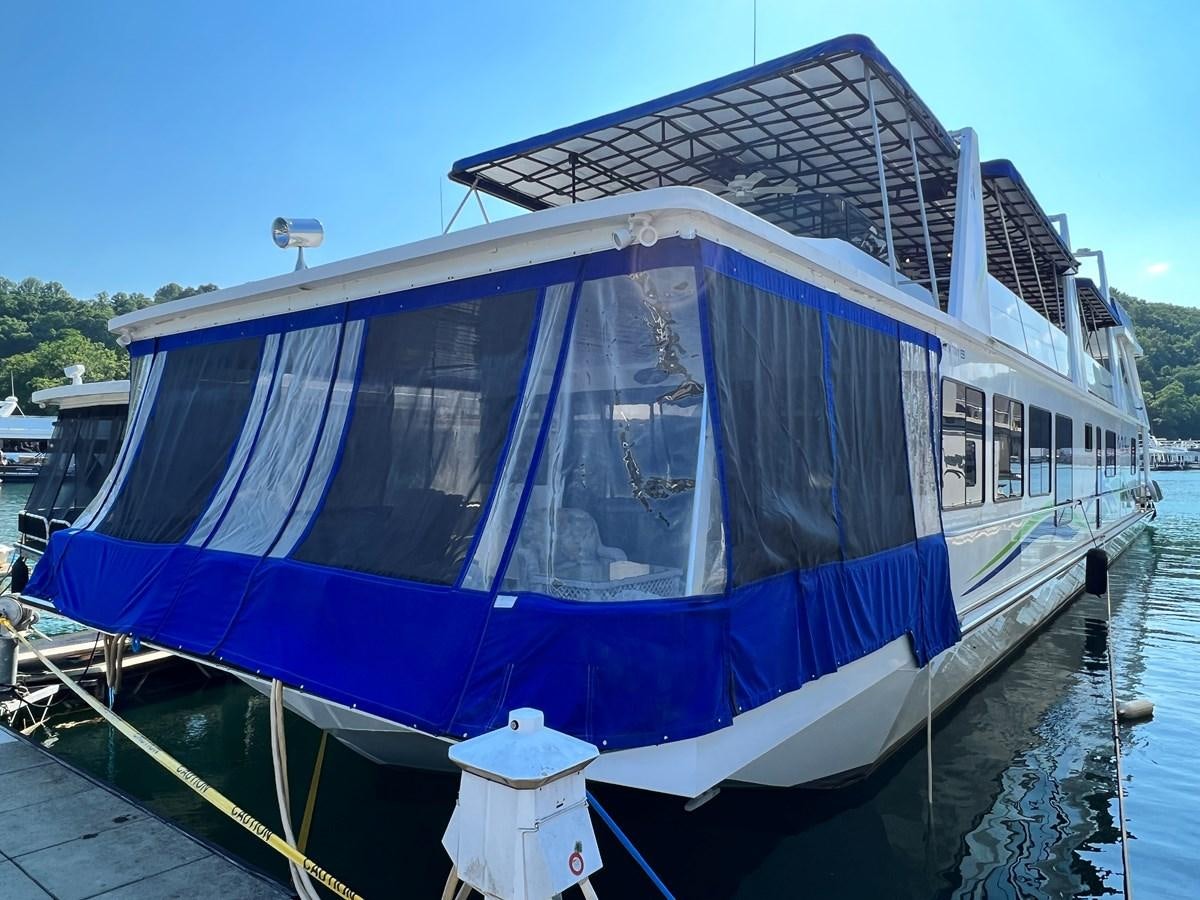 a boat docked at a pier aboard 2010/1995 STARDUST 20 X 95WB NLST Yacht for Sale