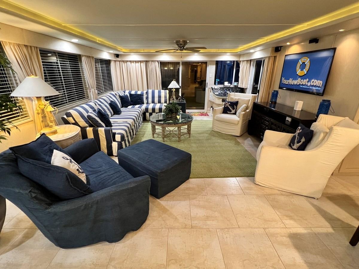 a living room with a large screen aboard 2010/1995 STARDUST 20 X 95WB NLST Yacht for Sale