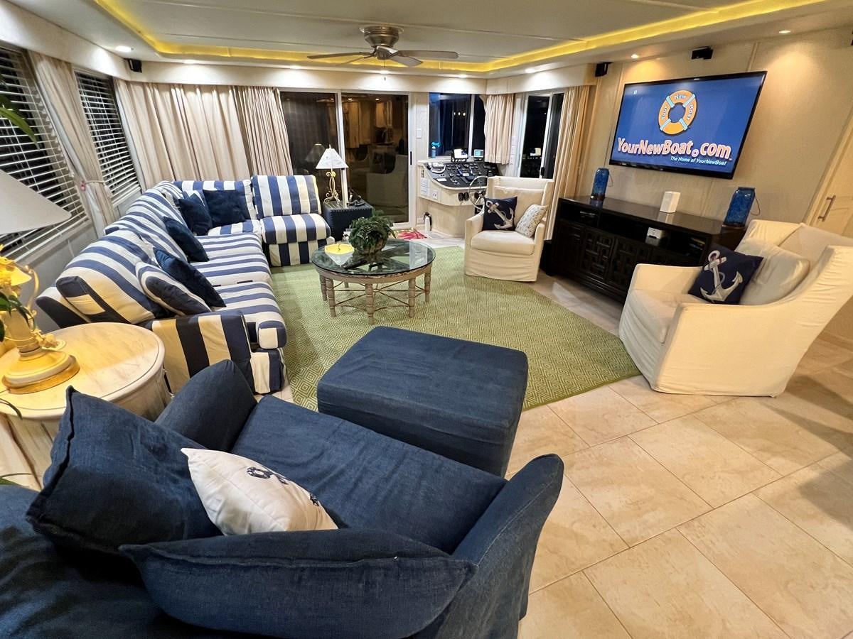 a living room with a large screen aboard 2010/1995 STARDUST 20 X 95WB NLST Yacht for Sale