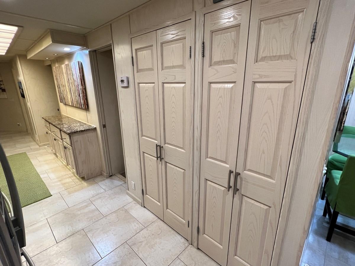 a hallway with white doors aboard 2010/1995 STARDUST 20 X 95WB NLST Yacht for Sale