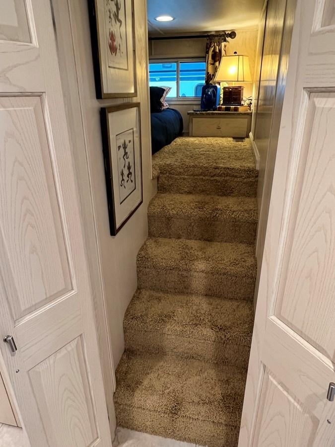 a person sitting on a couch aboard 2010/1995 STARDUST 20 X 95WB NLST Yacht for Sale