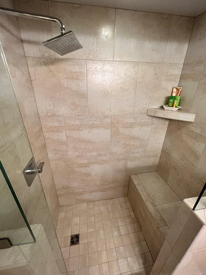 a shower with tile walls aboard 2010/1995 STARDUST 20 X 95WB NLST Yacht for Sale