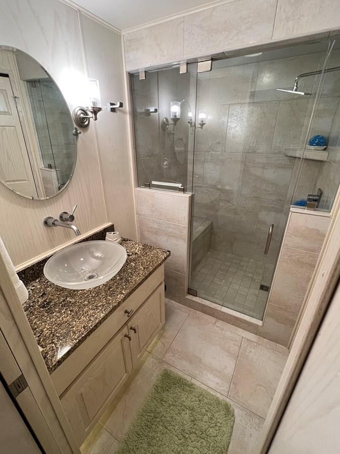 a bathroom with a marble counter top aboard 2010/1995 STARDUST 20 X 95WB NLST Yacht for Sale