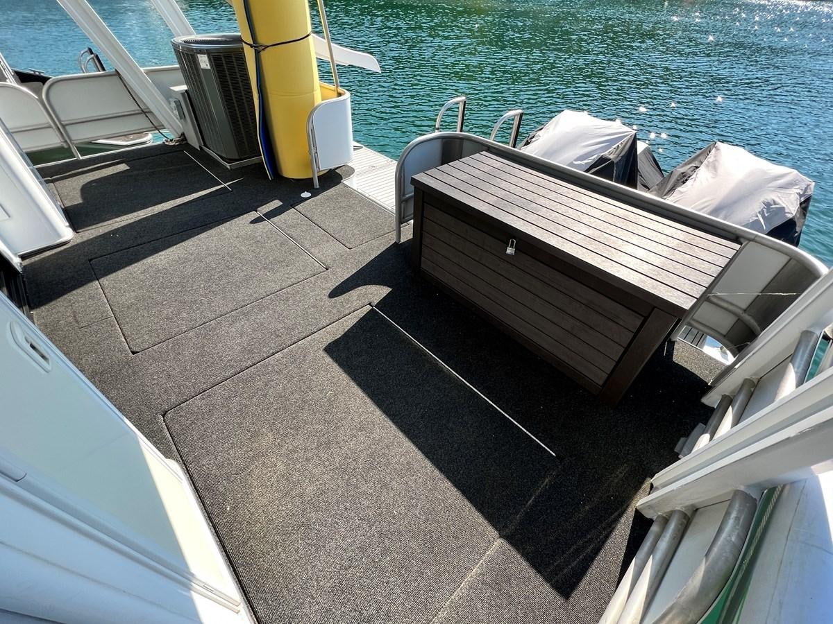 a boat on a deck aboard 2010/1995 STARDUST 20 X 95WB NLST Yacht for Sale