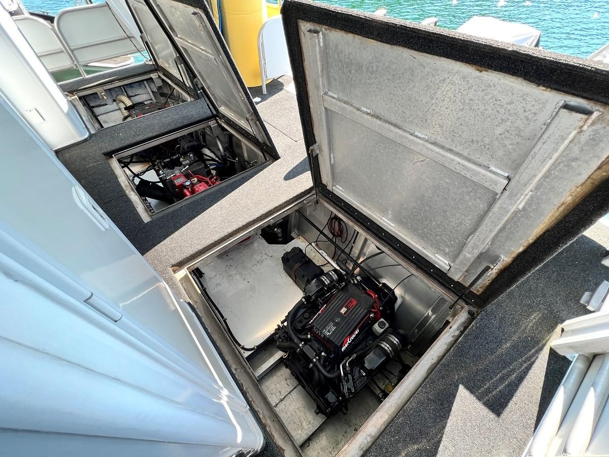 a car with a door open aboard 2010/1995 STARDUST 20 X 95WB NLST Yacht for Sale