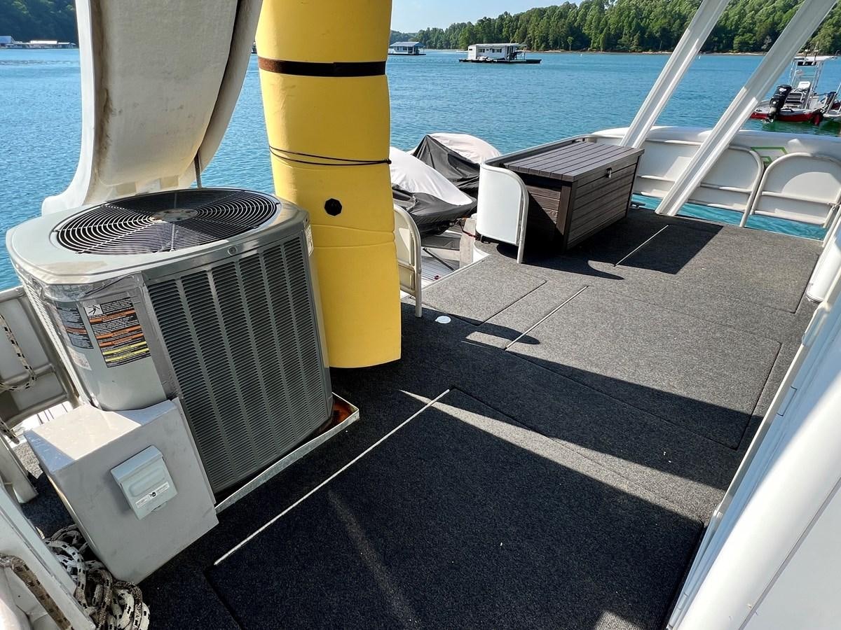 a metal container on a dock aboard 2010/1995 STARDUST 20 X 95WB NLST Yacht for Sale