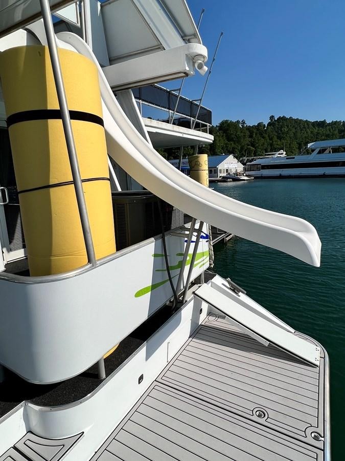 a boat is parked on the water aboard 2010/1995 STARDUST 20 X 95WB NLST Yacht for Sale
