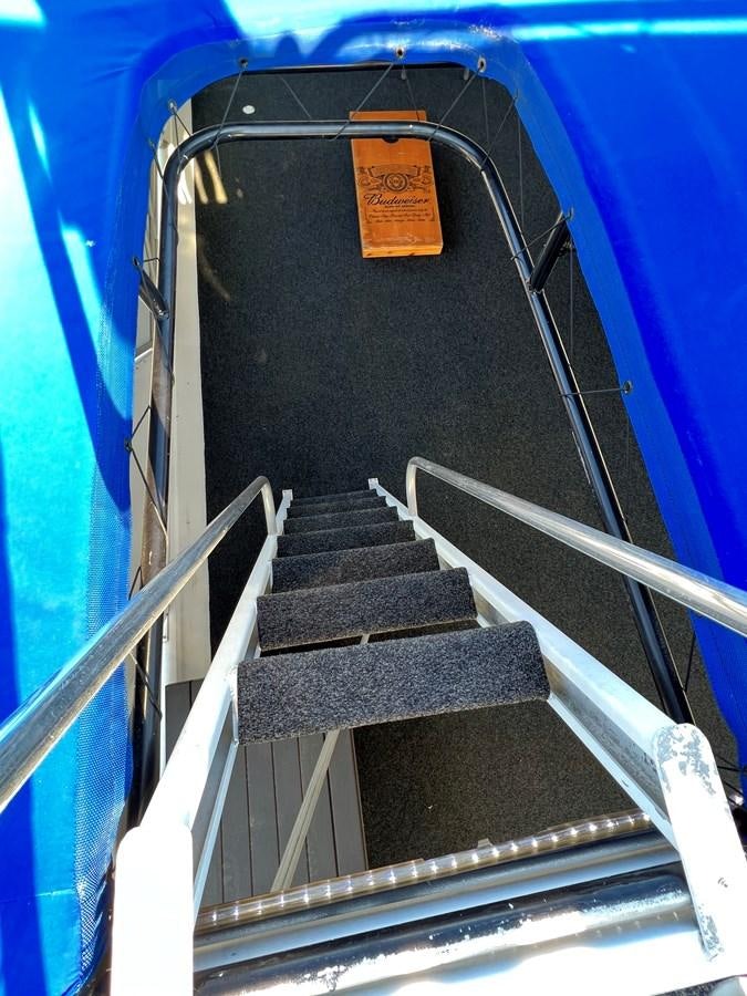 a staircase with a metal railing aboard 2010/1995 STARDUST 20 X 95WB NLST Yacht for Sale