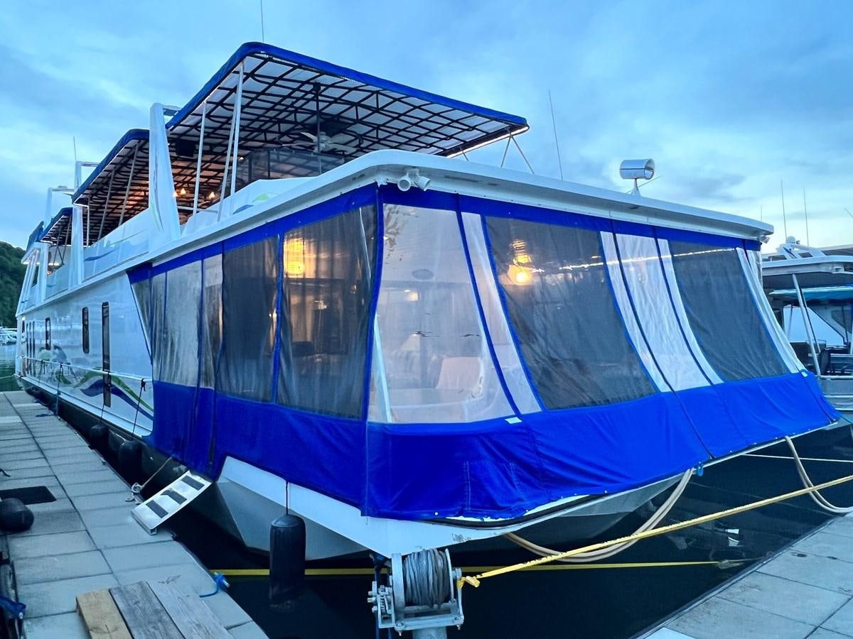 a blue and white boat aboard 2010/1995 STARDUST 20 X 95WB NLST Yacht for Sale