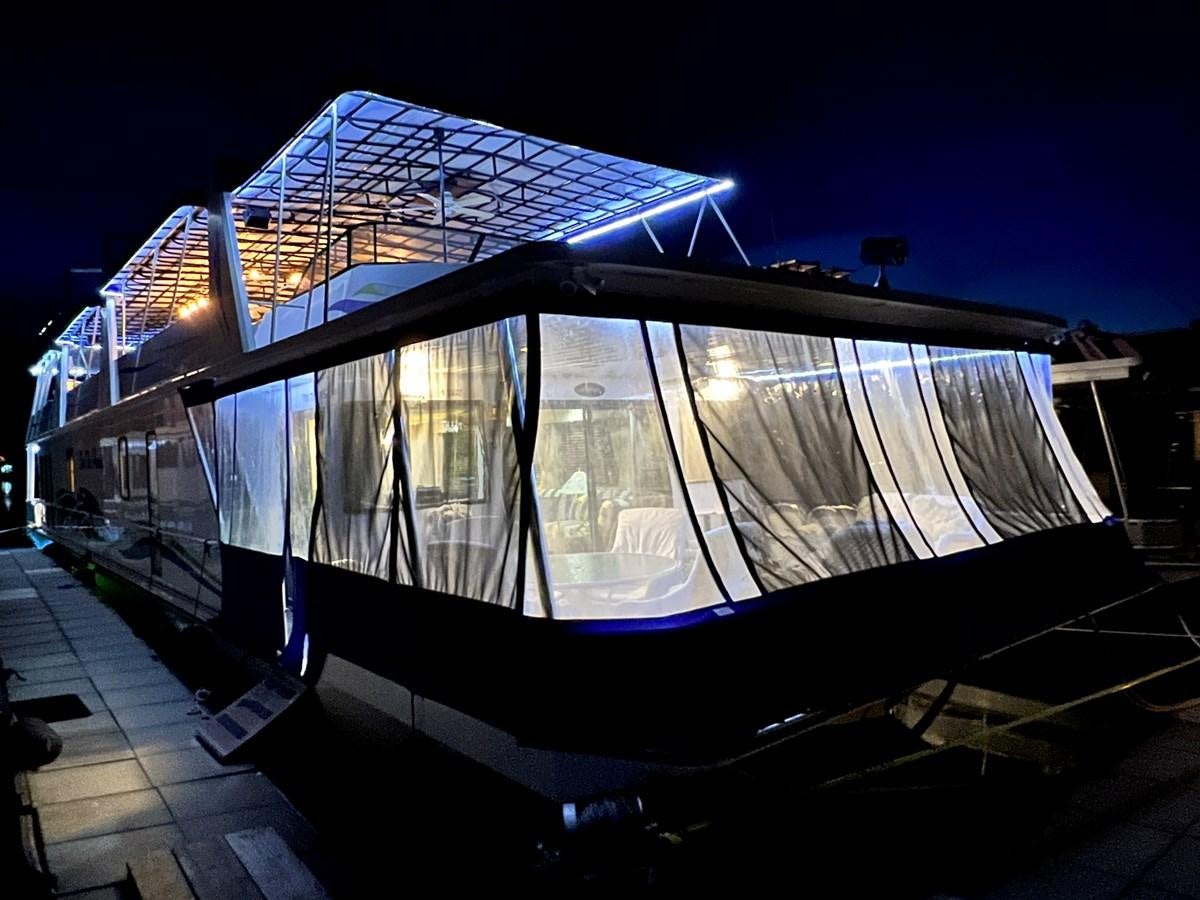 a train with a large glass roof aboard 2010/1995 STARDUST 20 X 95WB NLST Yacht for Sale