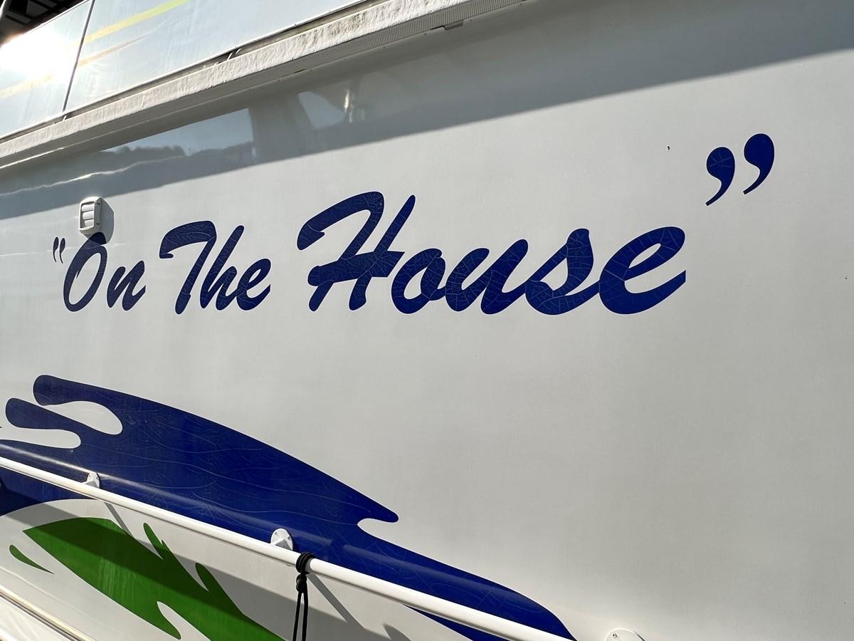 a white sign with blue lettering aboard 2010/1995 STARDUST 20 X 95WB NLST Yacht for Sale